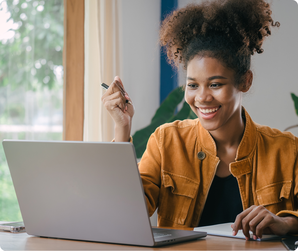 Person learning with campusGenAI on laptop